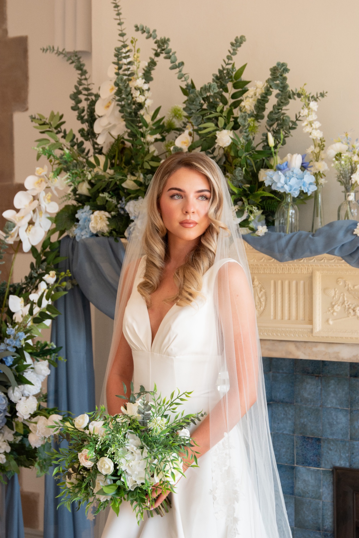 Bride with a veil and bouquet